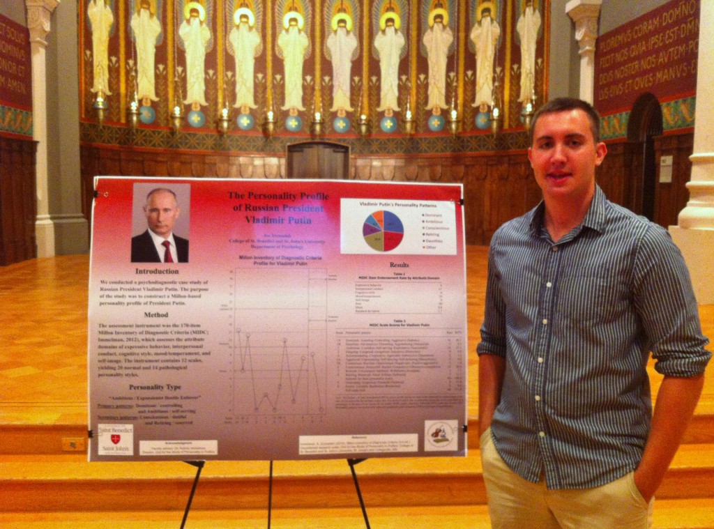 Joe Trenzeluk presents his research on "The personality profile of Russian president Vladimir Putin" at the Undergraduate Research Poster Session, Great Hall, St. John's University, Collegeville, Minn., Aug. 6, 2014.